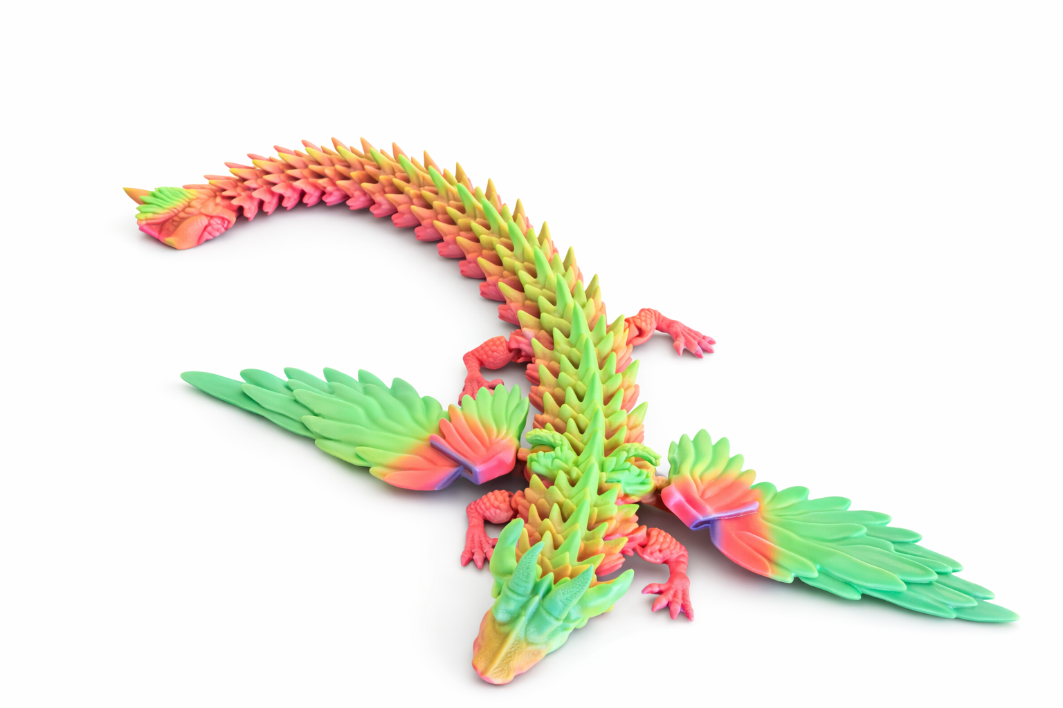 Colorful articulated 3D printed dragon with wings