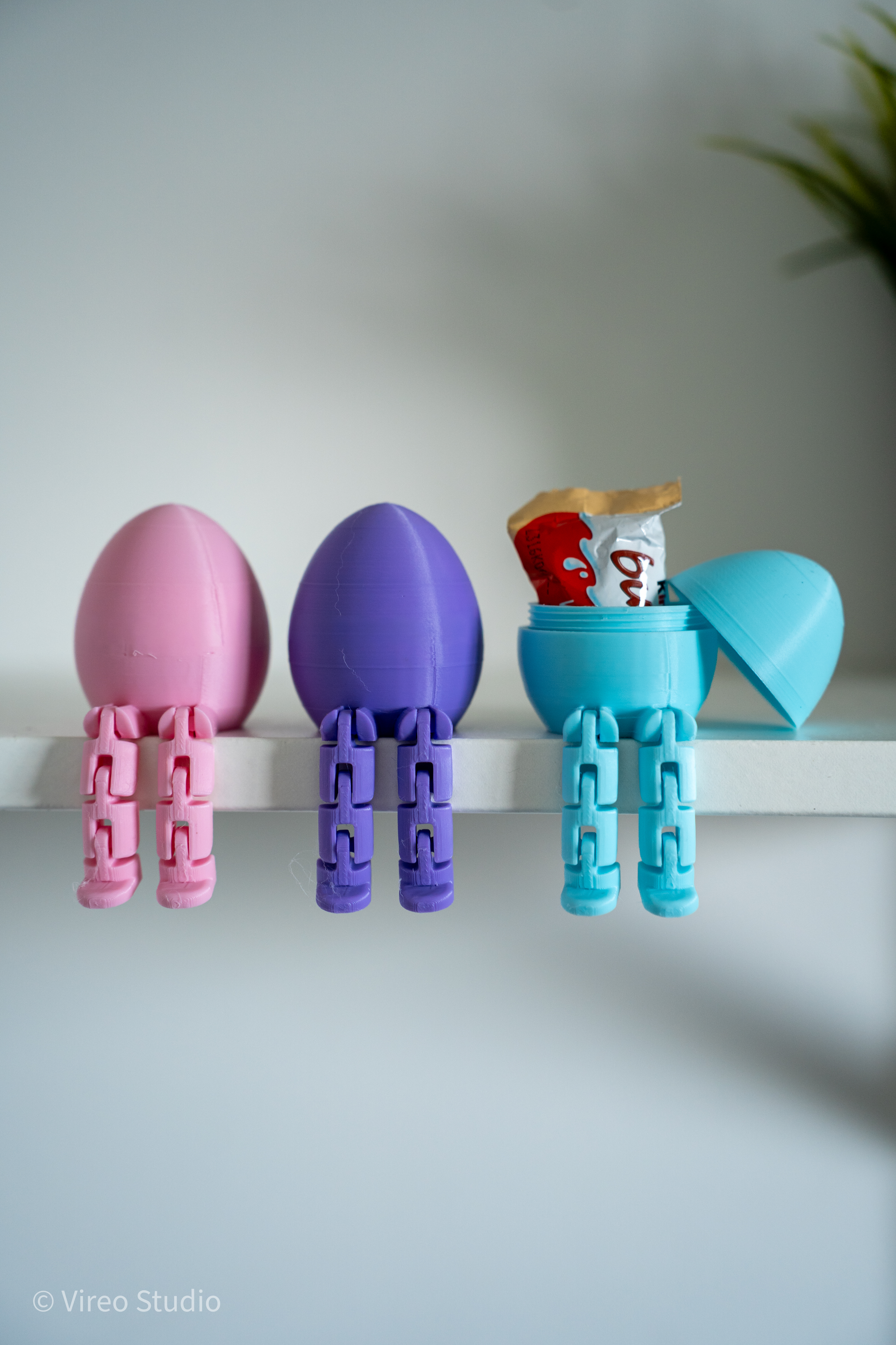 Fleggy flexi egg buddy with storage compartment open and candy inside