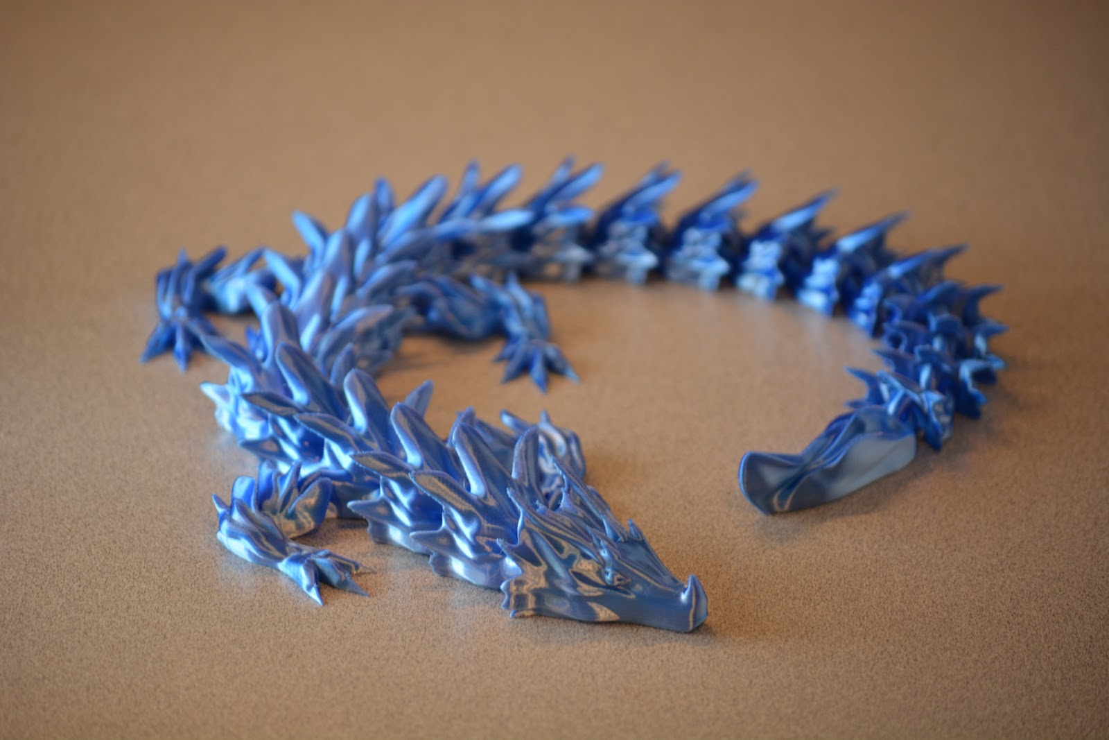 Water Dragon articulated dragon in a glossy blue finish